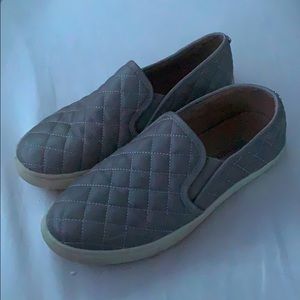 slightly worn steve madden slip ons